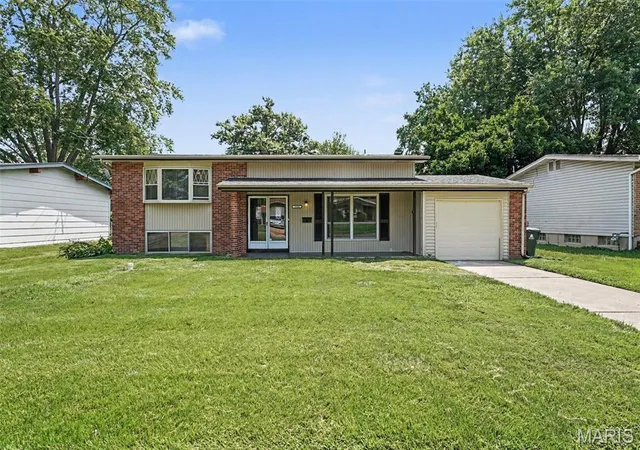 Single family home for sale at 1530 Loveland Dr, Florissant, MO 63031 | MLS# MIS26049554