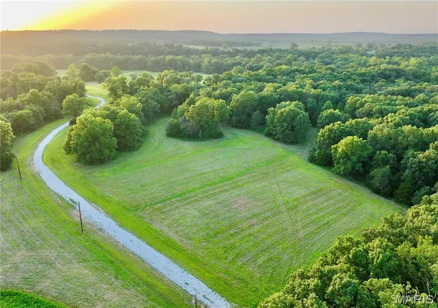 2nd image of Tbd Se 800 Rd T24&t25, Collins, MO 64738 | MLS# MIS26050729