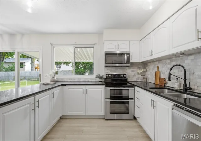 Photo 4 of Sale Pending at 2366 Villager Park Ct, Maryland Heights, MO 63043 | MLS# MIS26051773 | Listing updated on 2026-08-20