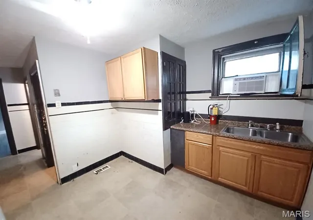 Photo 3 of Single family home for sale at 8328 Strathmore Pl, Saint Louis, MO 63136 | MLS# MIS26051947 | Listing updated on 2026-09-01