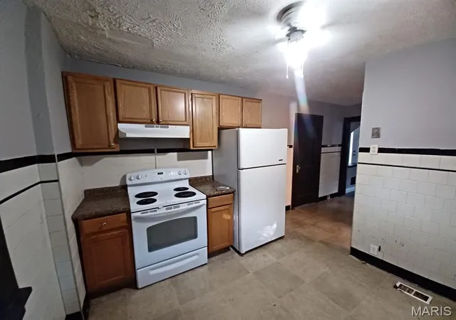 Photo 4 of Single family home for sale at 8328 Strathmore Pl, Saint Louis, MO 63136 | MLS# MIS26051947 | Listing updated on 2026-09-01