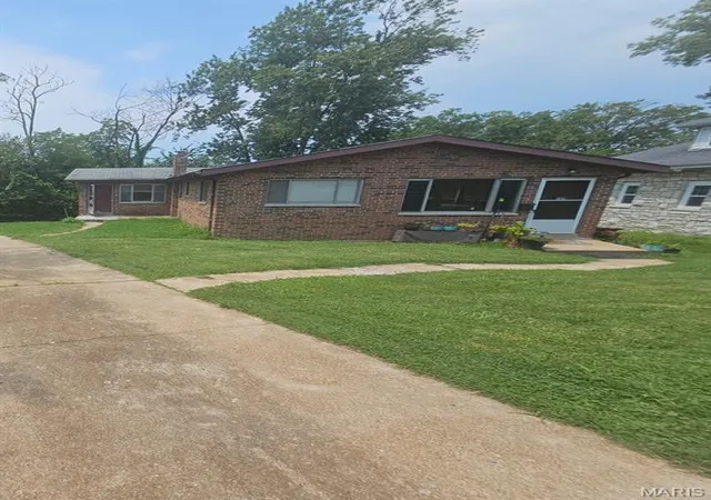 Photo 1 of Multi family home for sale at 1409 Nixon Ave, University City, MO 63130 | MLS# MIS26052401 | Listing updated on 2026-08-31