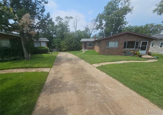 Photo 2 of Multi family home for sale at 1409 Nixon Ave, University City, MO 63130 | MLS# MIS26052401 | Listing updated on 2026-08-31
