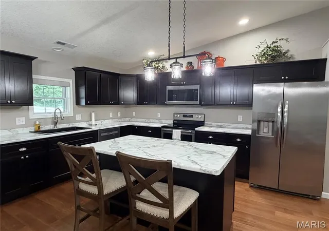 4th image of 4010 Breckenridge Dr, Hannibal, MO 63401 | MLS# MIS26054626