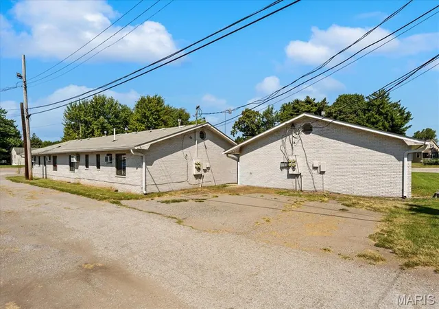 Photo 2 of Multi family home for sale at 1906 Rhodes St, Madison, IL 62060 | MLS# MIS26055184 | Listing updated on 2026-09-04