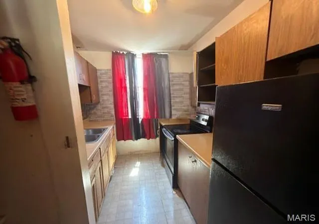 Photo 3 of Townhouse for sale at 736 N Newstead Ave #2, St Louis, MO 63108 | MLS# MIS26055233 | Listing updated on 2026-08-26