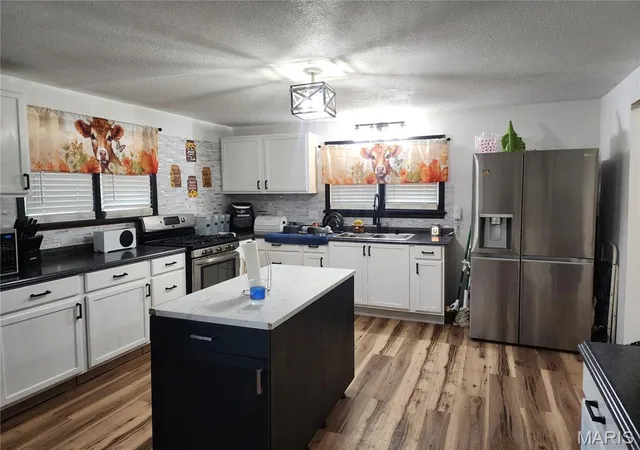 Photo 3 of Single family home for sale at 4392 Flucom Rd, De Soto, MO 63020 | MLS# MIS26056931 | Listing updated on 2026-09-08