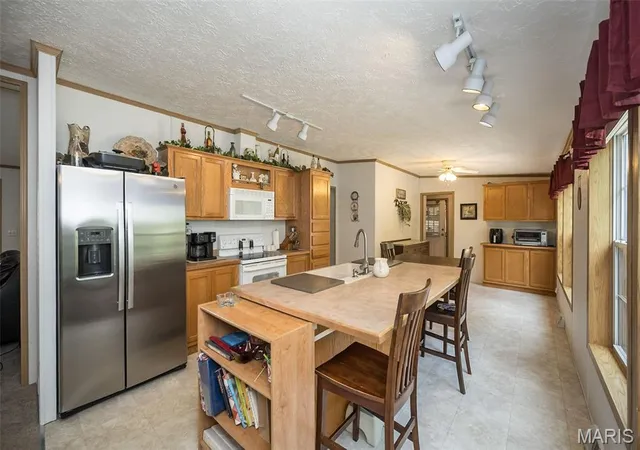 Photo 3 of Sale Pending at 218 S Warren Dr, Winfield, MO 63389 | MLS# MIS26057653 | Listing updated on 2026-09-14