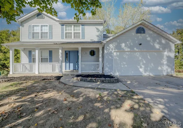 Single family home for sale at 2601 Red Cedar Parc Dr N, O Fallon, MO 63368 | MLS# MIS26058648
