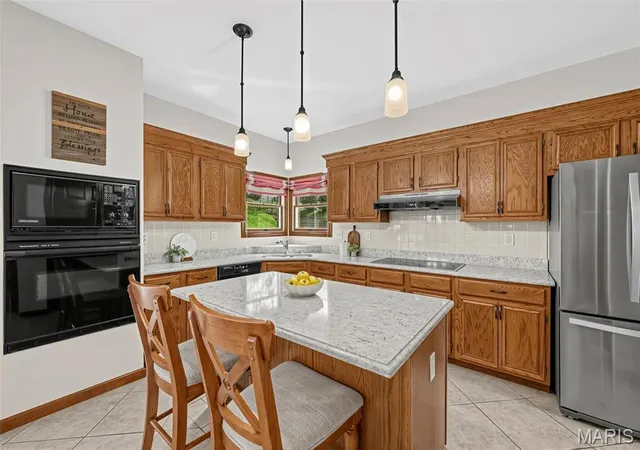 Photo 4 of Single family home for sale at 5026 Southridge Park Dr, Saint Louis, MO 63129 | MLS# MIS26058840 | Listing updated on 2026-10-07