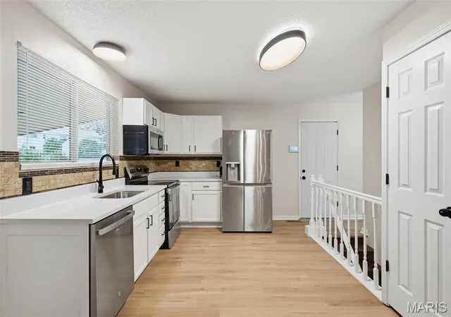 Photo 1 of Single family home for sale at 12929 Covington Gdns Dr, Saint Louis, MO 63138 | MLS# MIS26059073 | Listing updated on 2026-09-21