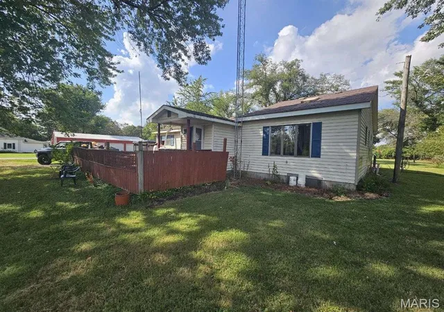Photo 1 of Single family home for sale at 303 W Reid St, Holliday, MO 65258 | MLS# MIS26059219 | Listing updated on 2026-09-30