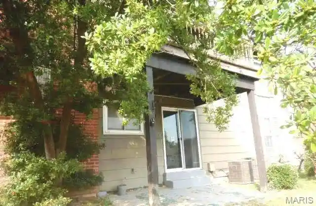 Listing Photo 1 - Condo for sale in 6671 Flowerfield Ln located at 6671 Flowerfield Ln, Florissant, MO 63033 - Unit 6671 Flowerfield Ln