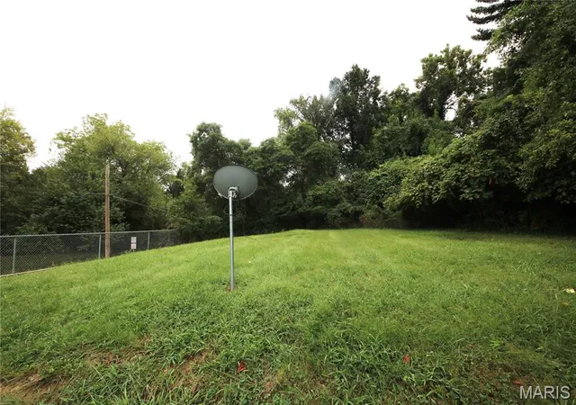 Photo 2 of Single family home for sale at 7402 Blanding Dr, Saint Louis, MO 63135 | MLS# MIS26061008 | Listing updated on 2026-09-22