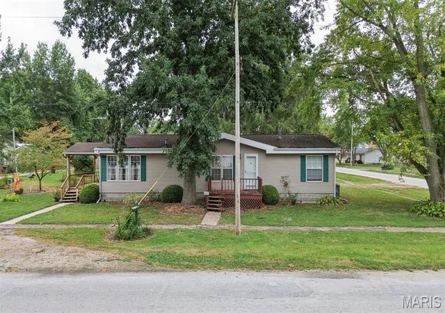 Photo 1 of Manufactured home for sale at 220 W Washington St, Medora, IL 62063 | MLS# MIS26061251 | Listing updated on 2026-10-01