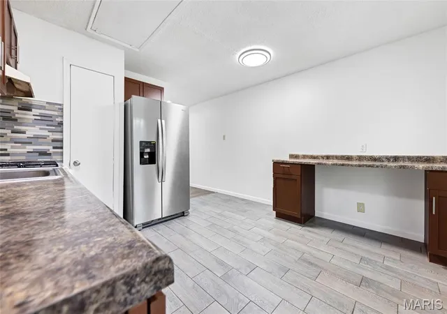 Photo 4 of Single family home for sale at 12157 Parkwood Pl, Maryland Heights, MO 63043 | MLS# MIS26061278 | Listing updated on 2026-09-24