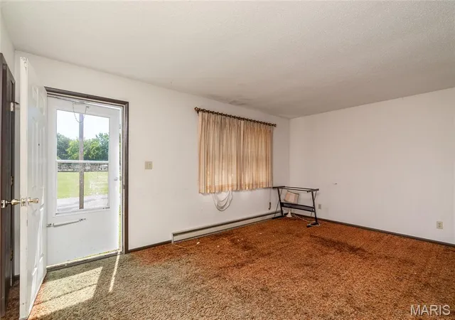 Photo 3 of Single family home for sale at 1000 W Church, Harrisburg, IL 62946 | MLS# MIS26062306 | Listing updated on 2026-09-27