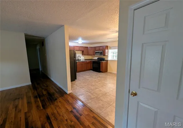 Photo 3 of Single family home for sale at 2305 Stoney End Ct, Florissant, MO 63031 | MLS# MIS26062321 | Listing updated on 2026-10-19