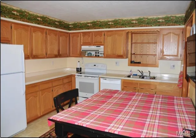 Photo 4 of Single family home for sale at 404 S Tellman Ave, Belle, MO 65013 | MLS# MIS26062499 | Listing updated on 2026-10-08