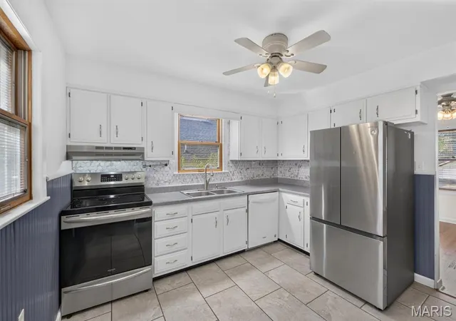 Photo 4 of Single family home for sale at 7034 Mitchell Ave, Saint Louis, MO 63117 | MLS# MIS26063352 | Listing updated on 2026-10-28
