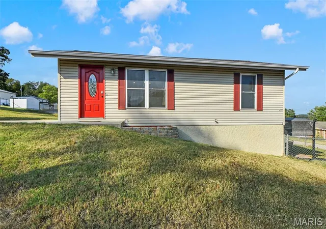 Single family home for sale at 400 Olive St, De Soto, MO 63020 | MLS# MIS26063664
