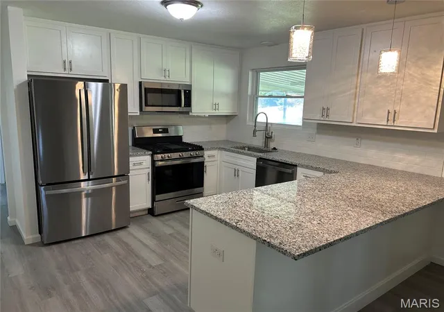 Photo 2 of Single family home for sale at 763 Wagon Ridge Dr, Fenton, MO 63026 | MLS# MIS26064034 | Listing updated on 2026-10-05