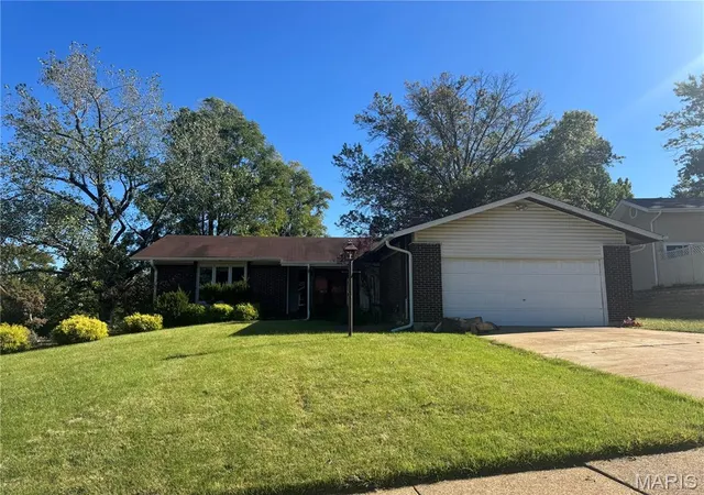 Single family home for sale at 6322 Sandycreek Dr, Florissant, MO 63033 | MLS# MIS26064244