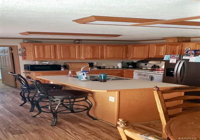 Photo 3 of Manufactured home for sale at 13990 Elm Dr, Plato, MO 65552 | MLS# MIS26064646 | Listing updated on 2026-10-08