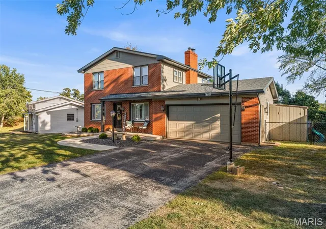 Photo 1 of Single family home for sale at 2136 Wildwind Ln, High Ridge, MO 63049 | MLS# MIS26064783 | Listing updated on 2026-10-09