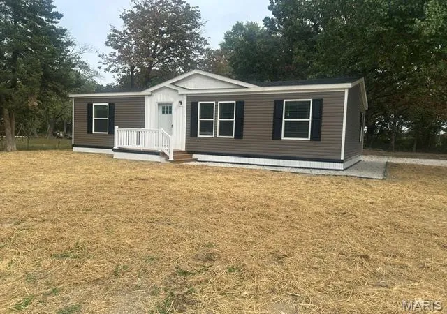 Photo 1 of Manufactured home for sale at 58 Beach Cir, Moscow Mills, MO 63362 | MLS# MIS26065434 | Listing updated on 2026-10-11