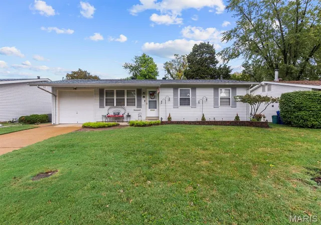 Single family home for sale at 975 Sherman Ln, Florissant, MO 63031 | MLS# MIS26066785