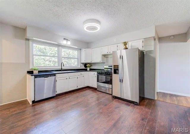 Photo 2 of Single family home for sale at 23 Manor Dr, Florissant, MO 63031 | MLS# MIS26067002 | Listing updated on 2026-10-21