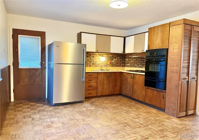 Photo 3 of Single family home for sale at 11716 Hollycrest Dr, Maryland Heights, MO 63043 | MLS# MIS26067276 | Listing updated on 2026-10-19