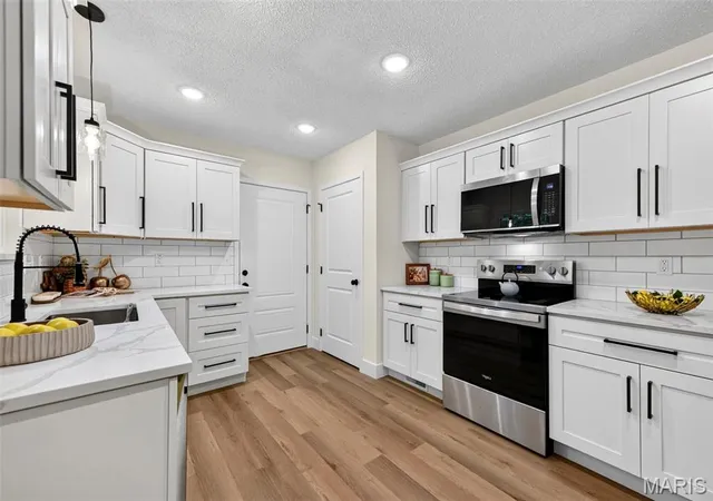 Photo 4 of Single family home for sale at 1911 Jean Dr, Arnold, MO 63010 | MLS# MIS26067361 | Listing updated on 2026-10-22