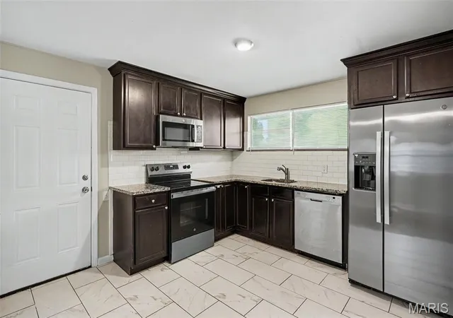 Photo 3 of Single family home for sale at 1370 Milbank Dr, Florissant, MO 63031 | MLS# MIS26067870 | Listing updated on 2026-10-23