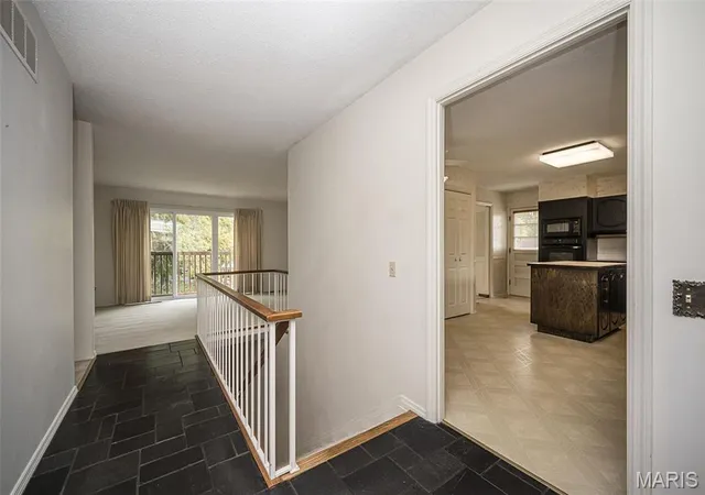 Photo 2 of Single family home for sale at 1728 Featherwood Dr, Saint Louis, MO 63146 | MLS# MIS26069447 | Listing updated on 2026-10-30