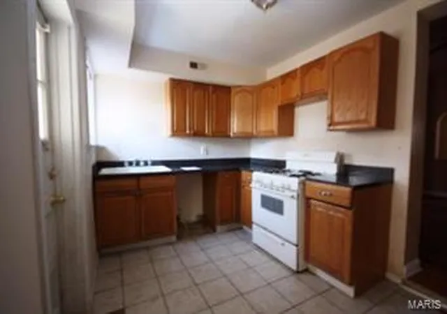 Photo 3 of Single Family Residence at 7818 Minnesota Ave, Saint Louis, MO 63111 | MLS# MIS15065218 | | Sold on 2016-01-13