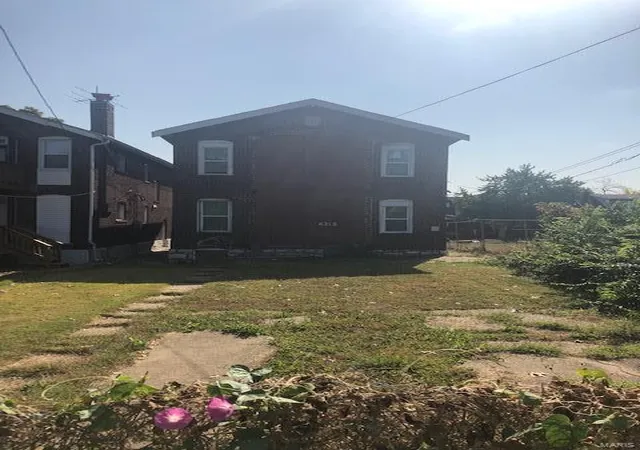 Photo 2 of Multi Family at 4215 Shreve Ave, Saint Louis, MO 63115 | MLS# MIS21003201 | | Sold on 2021-02-25