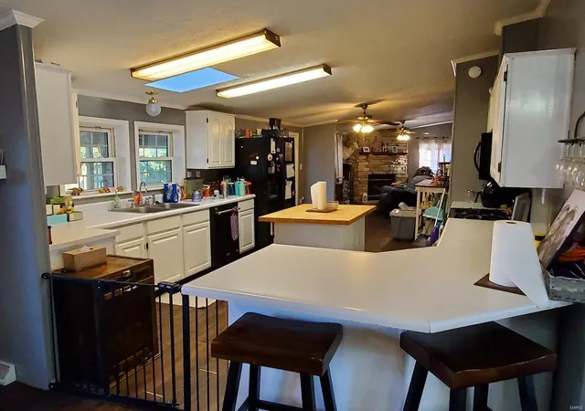 Photo 5 of Single Family Residence at 207 N Cooper St, Wayland, MO 63472 | MLS# MIS21074274 | | Sold on 2021-12-15