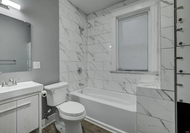 Photo 4 of Multi Family at 1145 Aubert Ave, Saint Louis, MO 63113 | MLS# MIS22034381 | | Sold on 2022-10-31