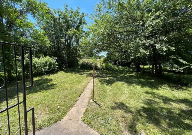 Photo 2 of Multi Family at 7915 Church Rd, Saint Louis, MO 63147 | MLS# MIS22038968 | | Sold on 2022-08-24
