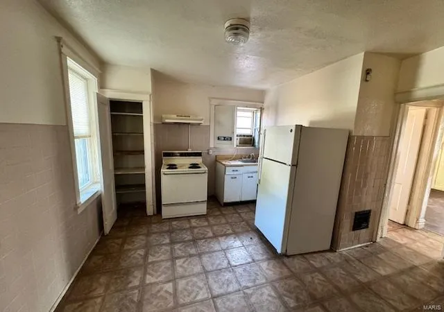 Photo 3 of Multi Family at 8715 Jennings Station Rd, Saint Louis, MO 63136 | MLS# MIS24030861 | | Sold on 2025-01-10