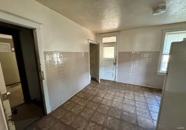 Photo 4 of Multi Family at 8715 Jennings Station Rd, Saint Louis, MO 63136 | MLS# MIS24030861 | | Sold on 2025-01-10