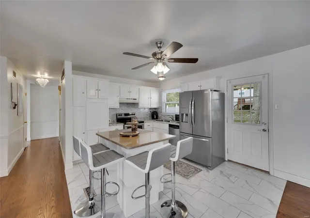 Photo 4 of Single Family Residence at 4125 Sunrise Way Dr, Saint Louis, MO 63125 | MLS# MIS24056861 | | Sold on 2024-12-20