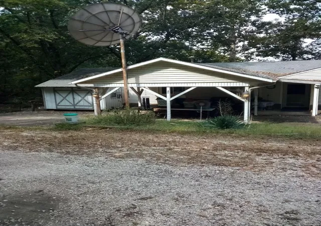 Photo 4 of Single Family Residence at 49 Vacation Hideaway Ln, Sunrise Beach, MO 65079 | MLS# MIS24063749 | | Sold on 2025-02-07