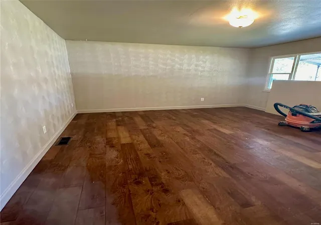 Photo 2 of Single Family Residence at 1150 Smith St, East Saint Louis, IL 62206 | MLS# MIS24067495 | | Sold on 2025-05-12