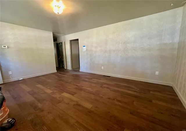 Photo 3 of Single Family Residence at 1150 Smith St, East Saint Louis, IL 62206 | MLS# MIS24067495 | | Sold on 2025-05-12