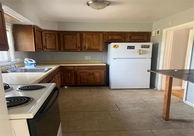 Photo 4 of Single Family Residence at 1387 Trampe Ave, Saint Louis, MO 63138 | MLS# MIS24069161 | | Sold on 2025-03-07