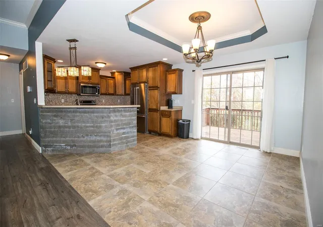 Photo 3 of Single Family Residence at 180 Ellsworth Dr, Holts Summit, MO 65043 | MLS# MIS24069821 | | Sold on 2025-02-18