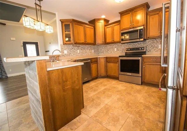 Photo 5 of Single Family Residence at 180 Ellsworth Dr, Holts Summit, MO 65043 | MLS# MIS24069821 | | Sold on 2025-02-18